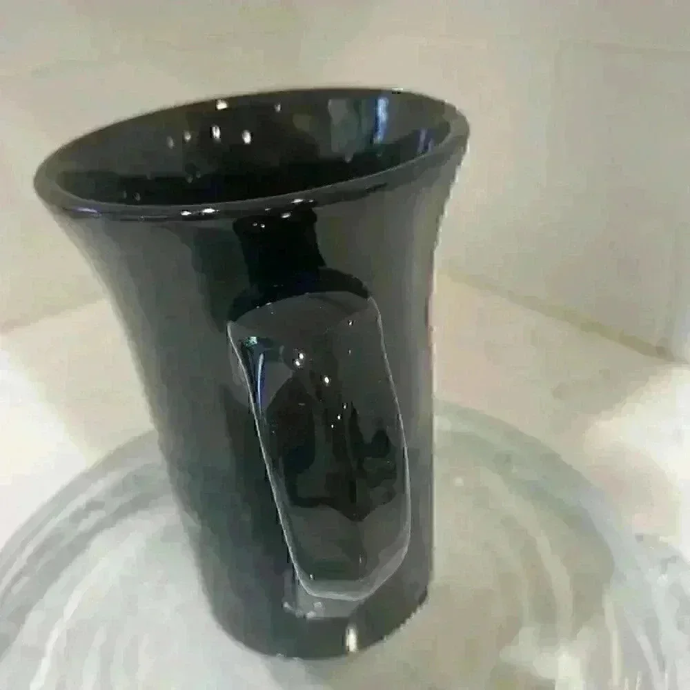 The Walt Disney Studios Black mug